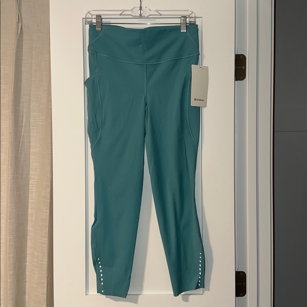 NWT Lululemon Teal Women’s Leggings Size 10 Fast and Free HR Tight 25” w pockets